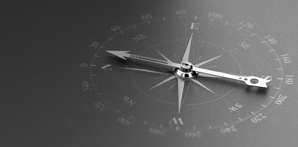 Photo of a compass representing a Business Purpose